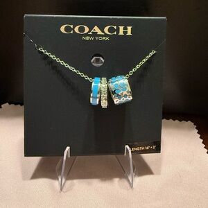 Coach Signature Enamel Necklace (Style C9446) silver-tone finish blue crystal